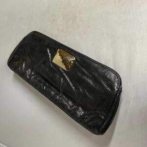 Michelle Fantaci for Lauren Merkin clutch.
